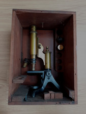 Vintage brass and cast iron monocular microscope