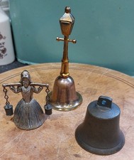 3 Vintage Small Novelty Bells Including Dutch Milk Maid And Bronze Bell.