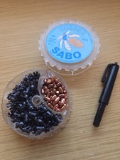 Vintage Sussex Sabo .22 Pellets and loading Pen. 100 pellets.