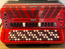 Roland flagship midi accordion FR7b with internal speakers and accessories.