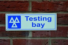 TESTING BAY sign or sticker