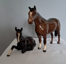 TWO VINTAGE BESWICK PONY/FOAL  LAYING DOWN.