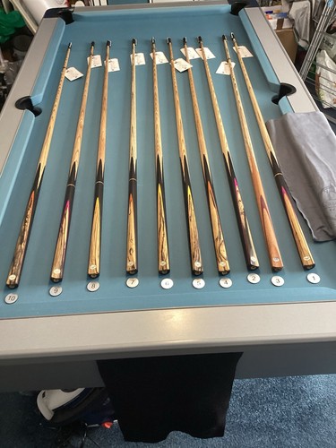 Cues with ebony splice every - with,