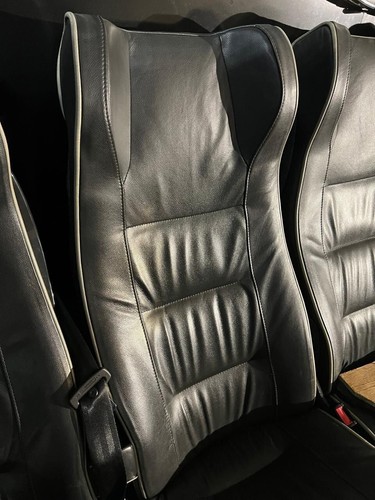 Black coach seats with - black,