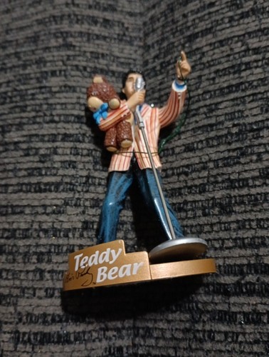 Elvis presley holding the - presley,