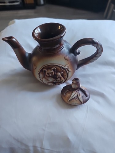 Swagman pottery piece with - swagman,