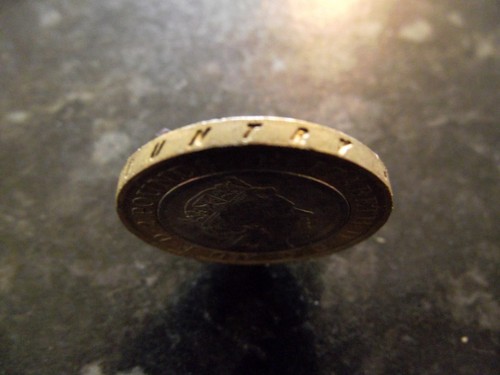 Rare pound coin first world - rare,