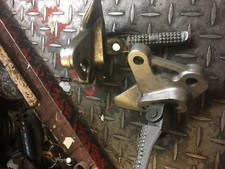 PULSE RAGE 125CC COMPLETE FRONT FOOTPEGS AND HANGERS 