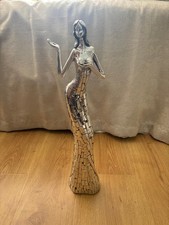 Lady in Dress Posing Statue