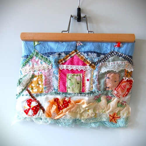 Beach huts hand - hand, stitched