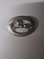 cap badge of the Northamptonshire Yeomanry, a unit of the British Army.