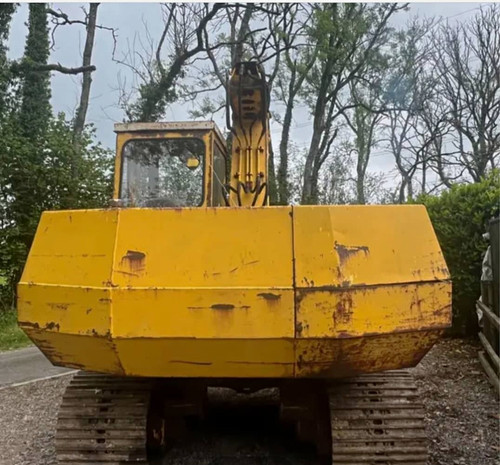 Yellow tracked excavator - yellow,