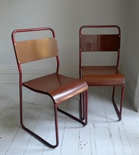 Vintage Cox Stacking Chairs; A Pair Tubular Steel Chairs with Rich Red Patina