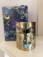 Erickson Beamon, Brass