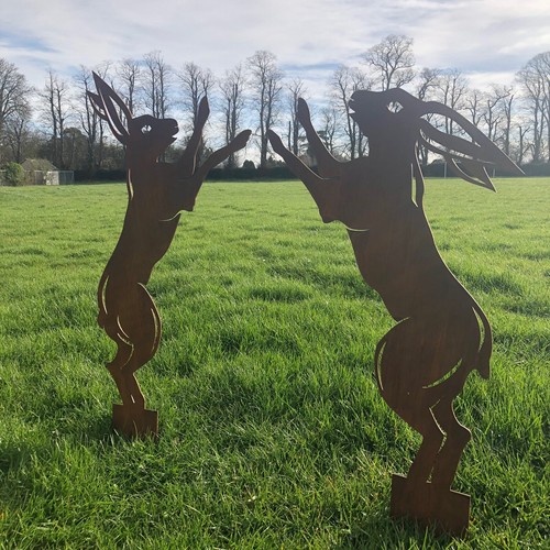 Big rusty metal boxing hares - boxing,