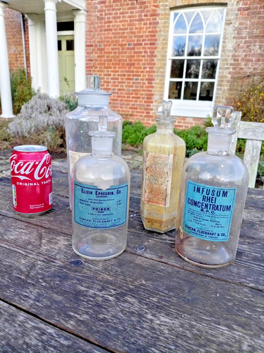 Vintage pharmacy bottles - pharmacy,