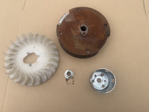 Flywheel with cooling fan - , and