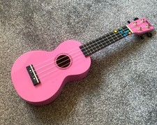 Kids pink ukulele by Mahalo, used