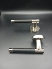 Pair Of Chrome And Black Rubberised Sprung Door Handles