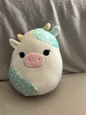 Squishmallows Belana Easter edition daisy print cow