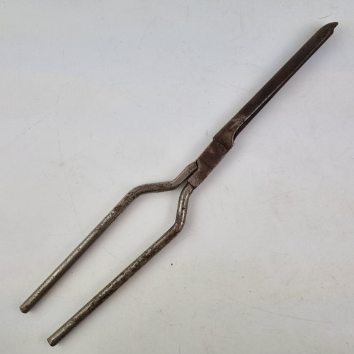 Antique pair steel curling - of,