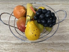 Artificial Selection Of Fruit In a Wood & Crome Basket