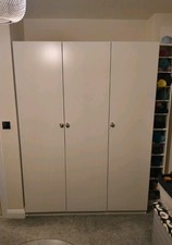 Triple IKEA Pax wardrobe with 3 doors, drawers, baskets, rails and shelves.