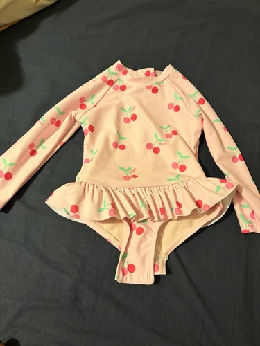 New never worn baby - never, cherry