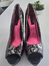 IRON FIST Heels Size 8 more