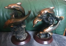 2 Dolphin Group  Ornaments bronze effect 7"H 6"W approximately 