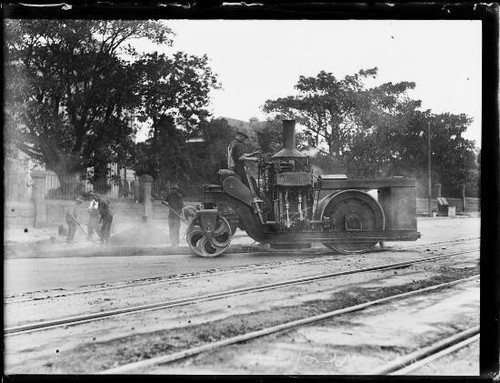 Man operating steam roller - man,