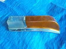 Plastic headlight arrow lens