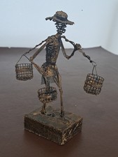 VINTAGE WIRE FIGURE OF A MAN CARRYING A  YOKE AND 3 BASKETS