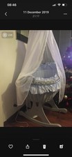 Rocking Crib.   Mattress And Canopy.    Grey  excellent condition.    Cost £400.