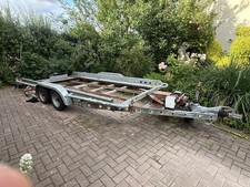 Brian James Hydraulic tilt bed dual purpose.