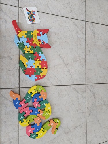 Two wooden alphabet puzzels - two,
