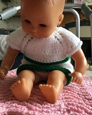 homemade handknitted feather and fan stitch 12-16" dolls pink blanket/playmat 