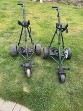 Pair of Powakaddy Freeway Golf Trolleys with One Lithium Battery and Charger