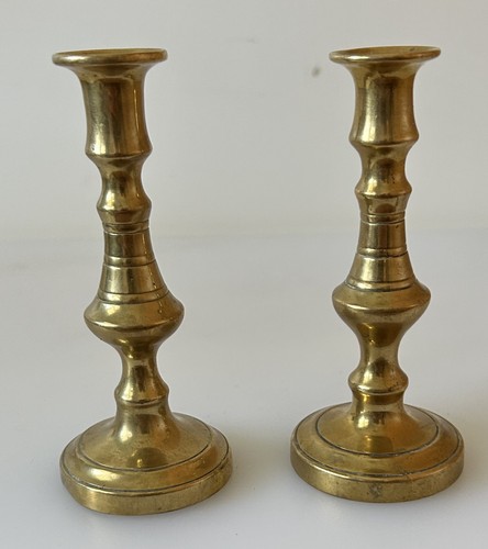 Pair small solid brass - of,