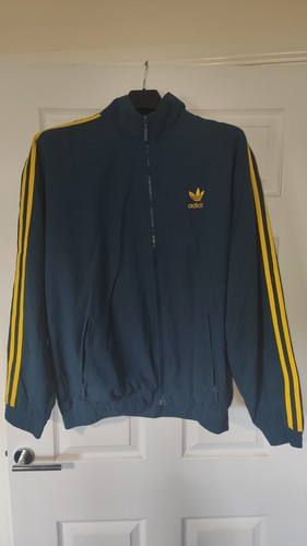 Blue and yellow adidas - and,