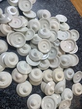 100 security tags with pins - ideal for clothing  shop. Good Used Condition