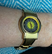 Unusual Rare gold tone watch with copper inserts on reverse.