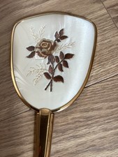 VINTAGE HAND HELD MIRROR IN GOLDTONE SURROUND WITH EMBROIDERED BACK PANEL 