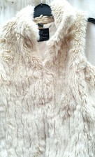 Size large,32" chest, Cream