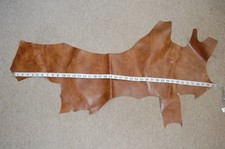 Tan brown real leather offcut Waxy finish Roughly 38" x 8" 96 x 20cm, 2mm thick