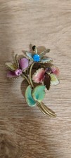Pair of vintage enamel flower brooches