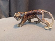 Hand made Porcelain Crouching Tiger. Finished in high gloss . 