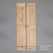 Solid oak bifold ledged door - ledged,