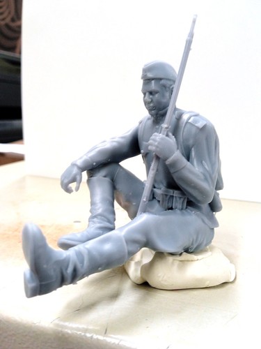 Sitting russian with - sitting, rifle