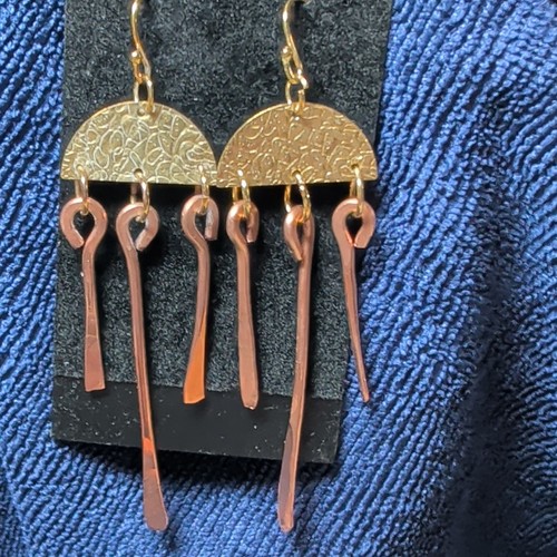 Gold copper tone round disc - &,